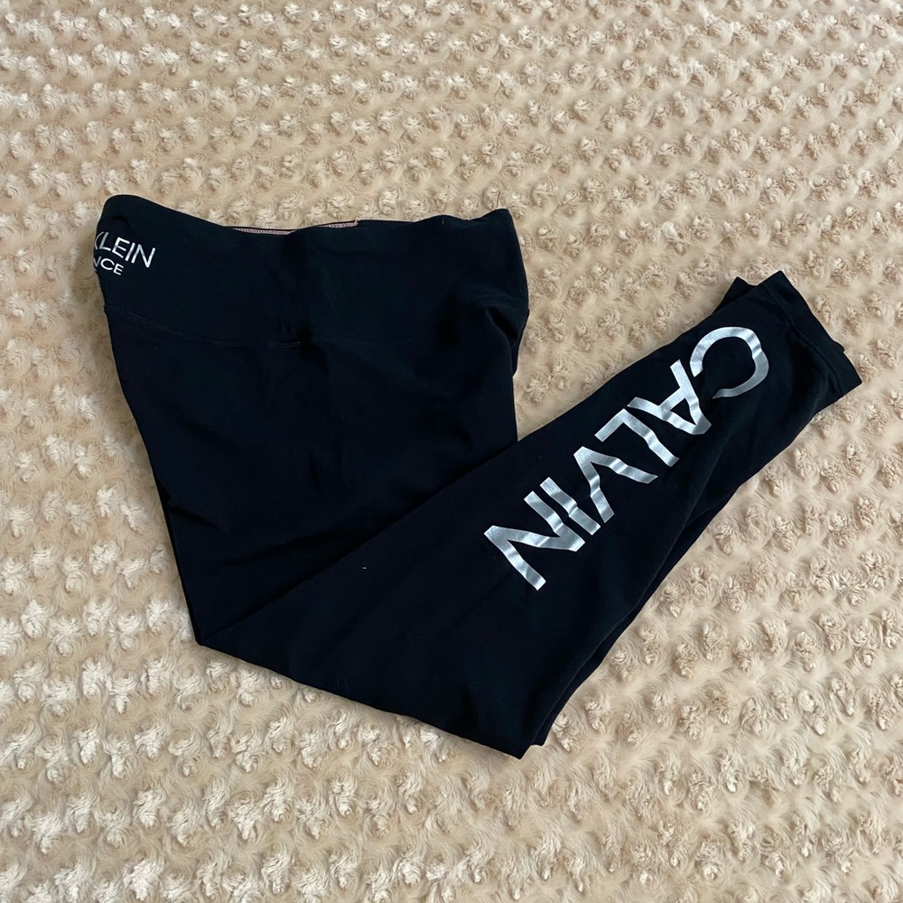 Calvin Klein Performance women Medium leggings with a vertical logo on the leg